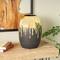 CosmoLiving by Cosmopolitan 13" Black Ceramic Vase with Abstract Gold Melting Drips